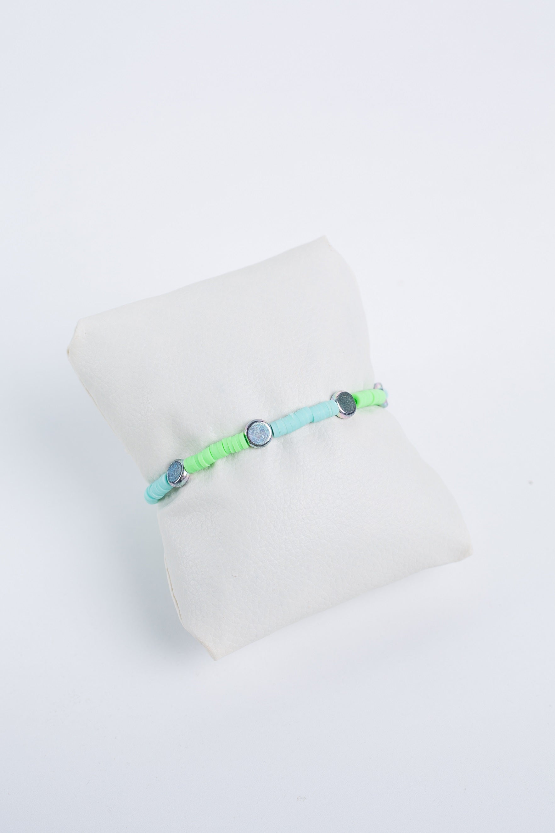 Daisy Ankelet in Discs in neon green + aqua